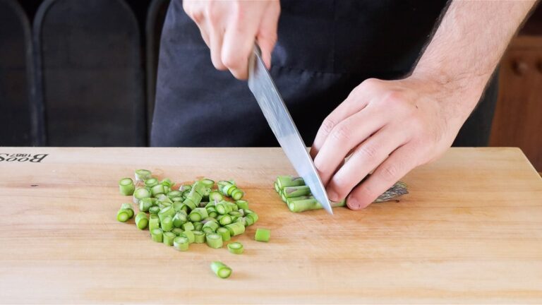 chopping the asparagus