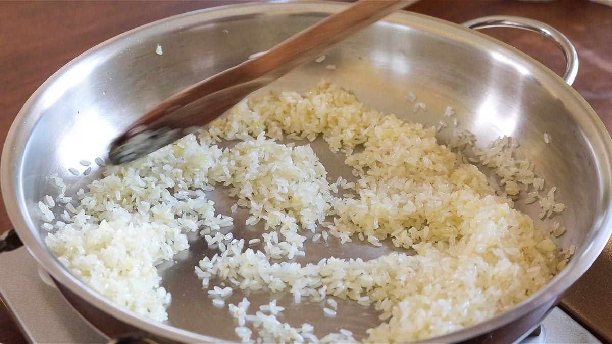 frying the onion and the rice