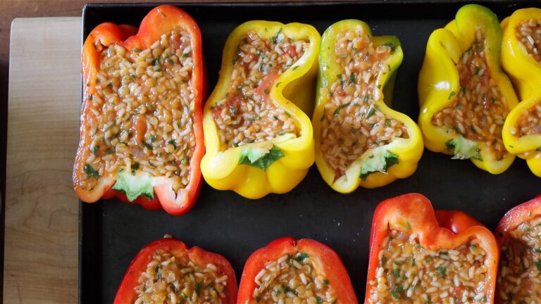 vegan stuffed bell peppers on a sheet pan