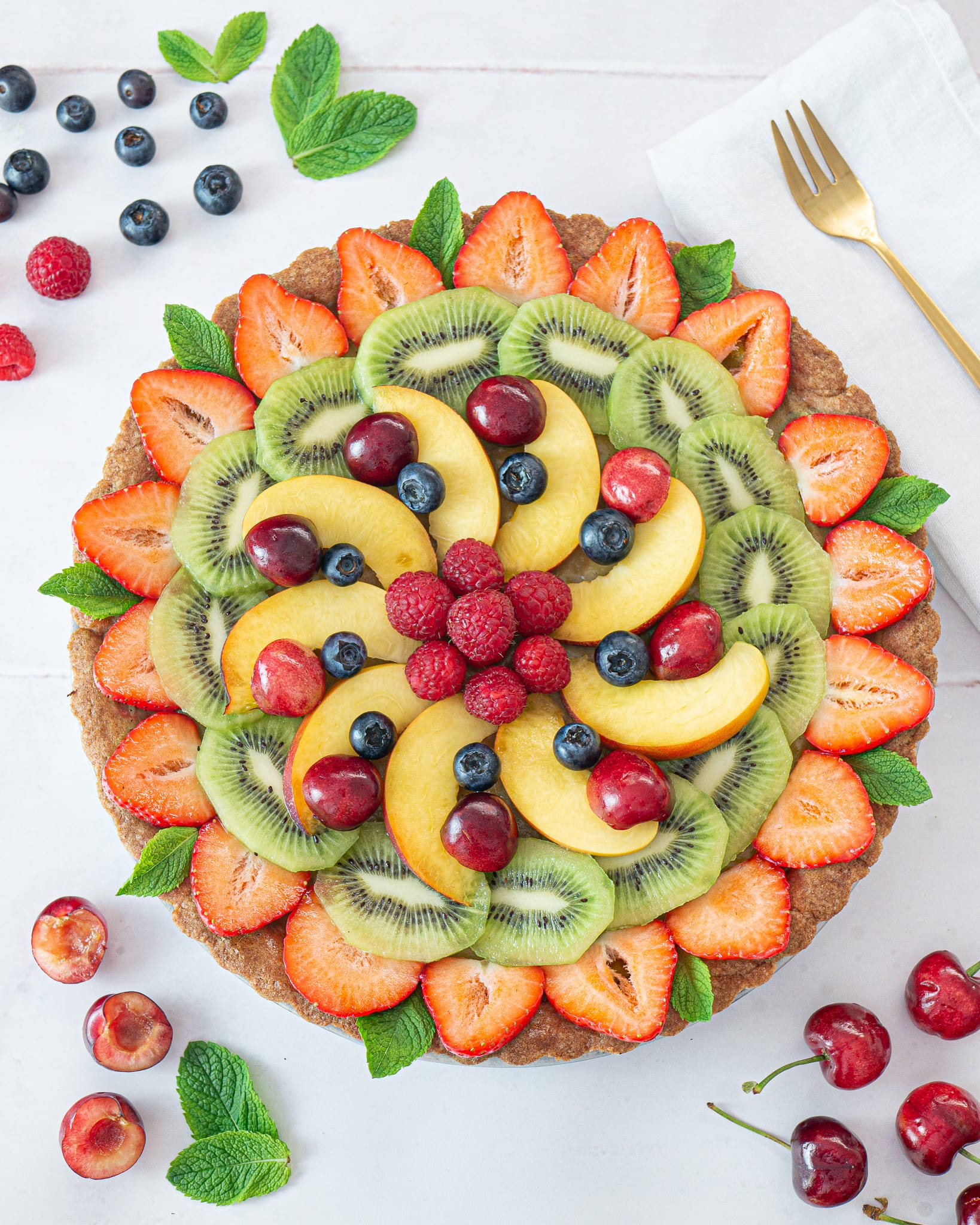 WHOLE FRUIT TART WITH VEGAN CUSTARD AND GOLDEN FORK