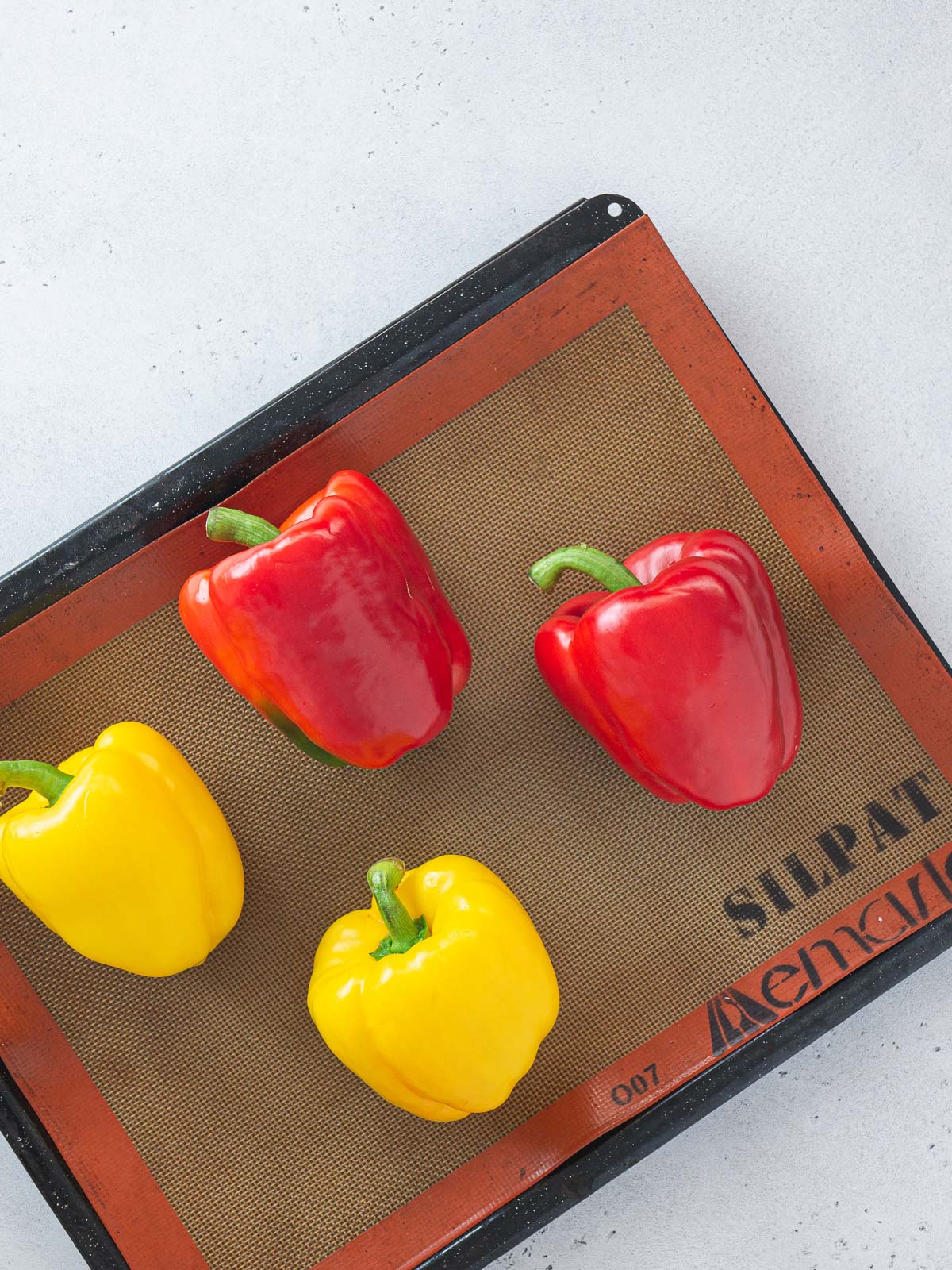 bell peppers on a baking tray