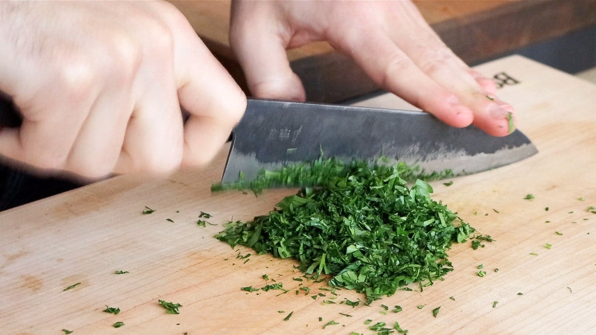 chopping the parsley