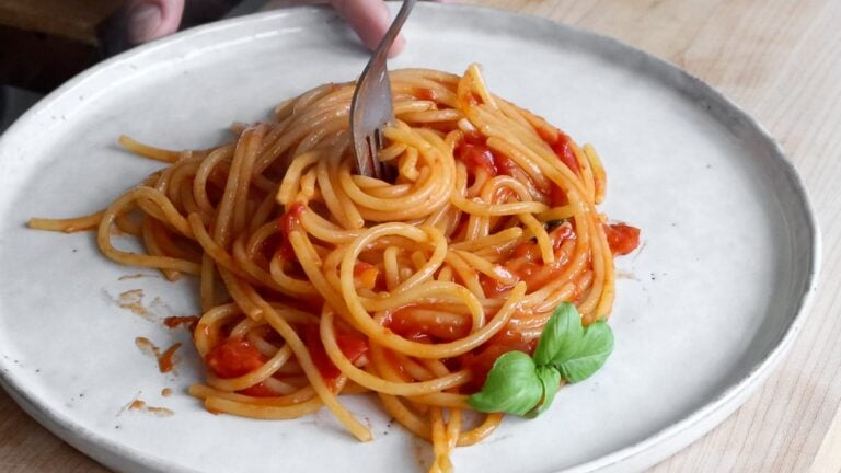 eating spaghetti al pomodoro