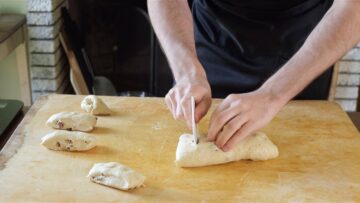 cutting the dough into 100g pieces