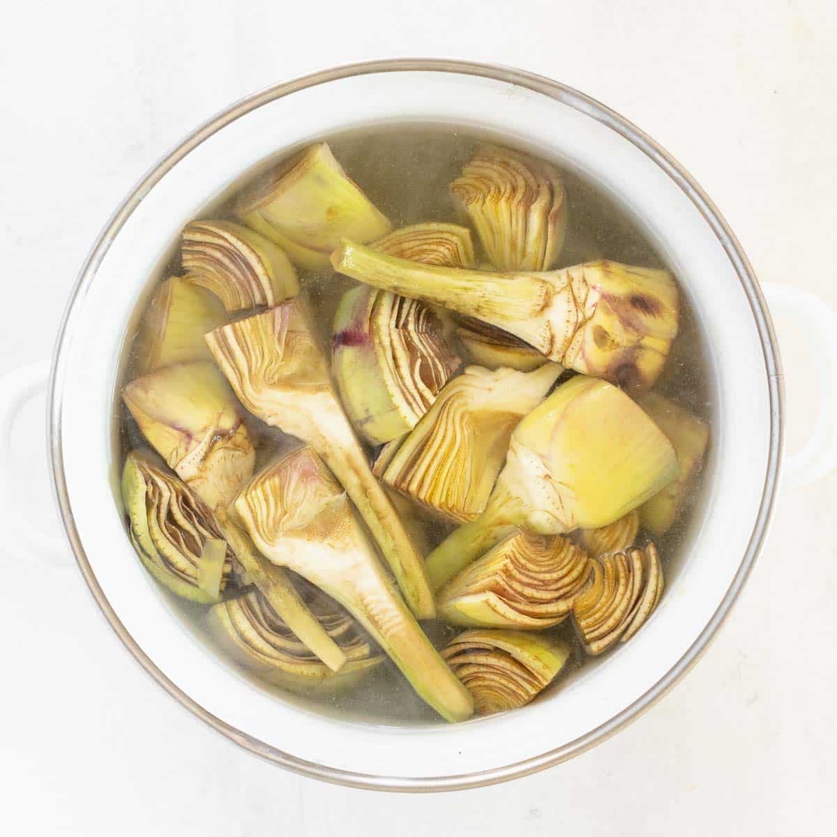 boiling he artichokes in water