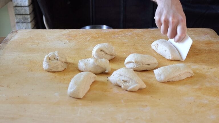 cutting the dough in 9 pieces