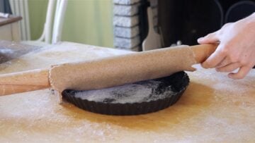 transferring dough into pie dish