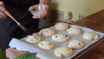 vegan brioche rolls with custard on a tray
