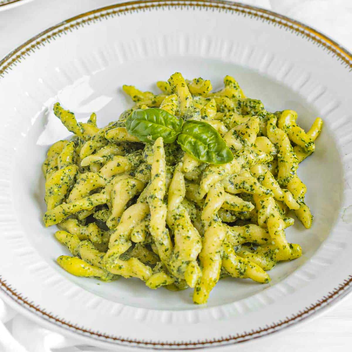 trofie pasta on a plate with basil pesto