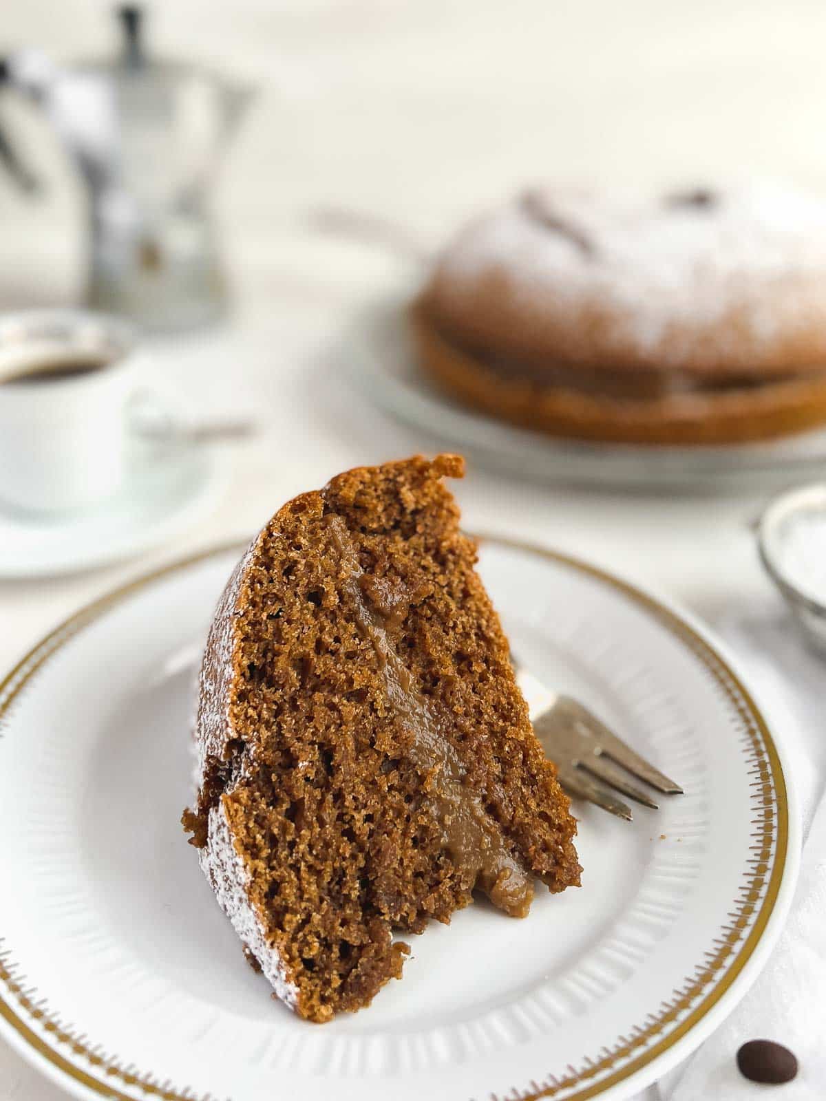 a slice of vegan coffee cake with coffee filling