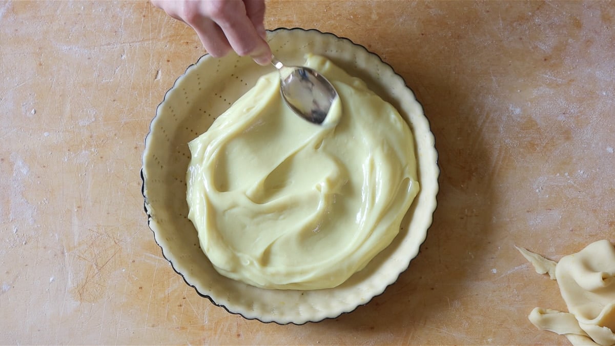 spreading the lemon custard in the pie