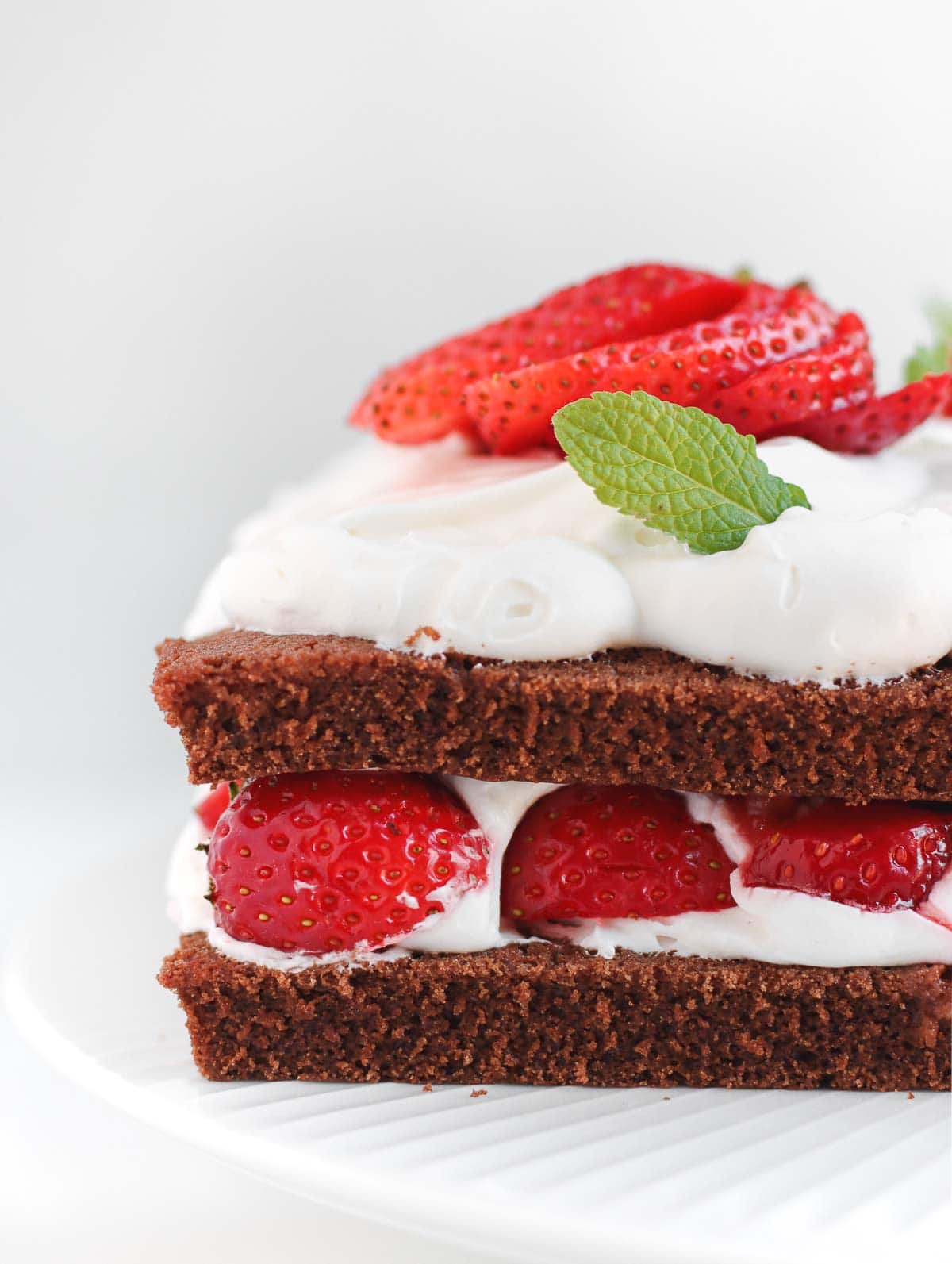 the edge of the chocolate and strawberry cake