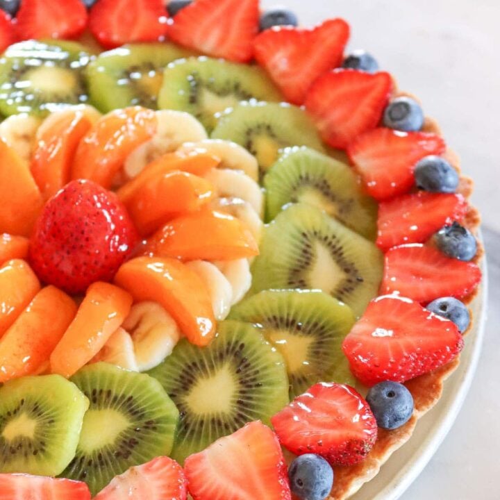 fruit tart with custard, strawberries and blueberries