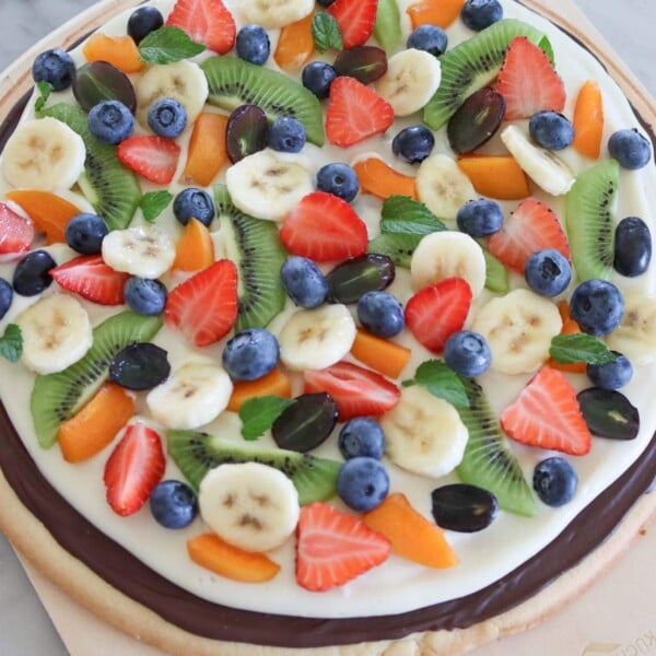 fruit pizza on a marble table