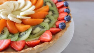 adding the fruit on top of the tart