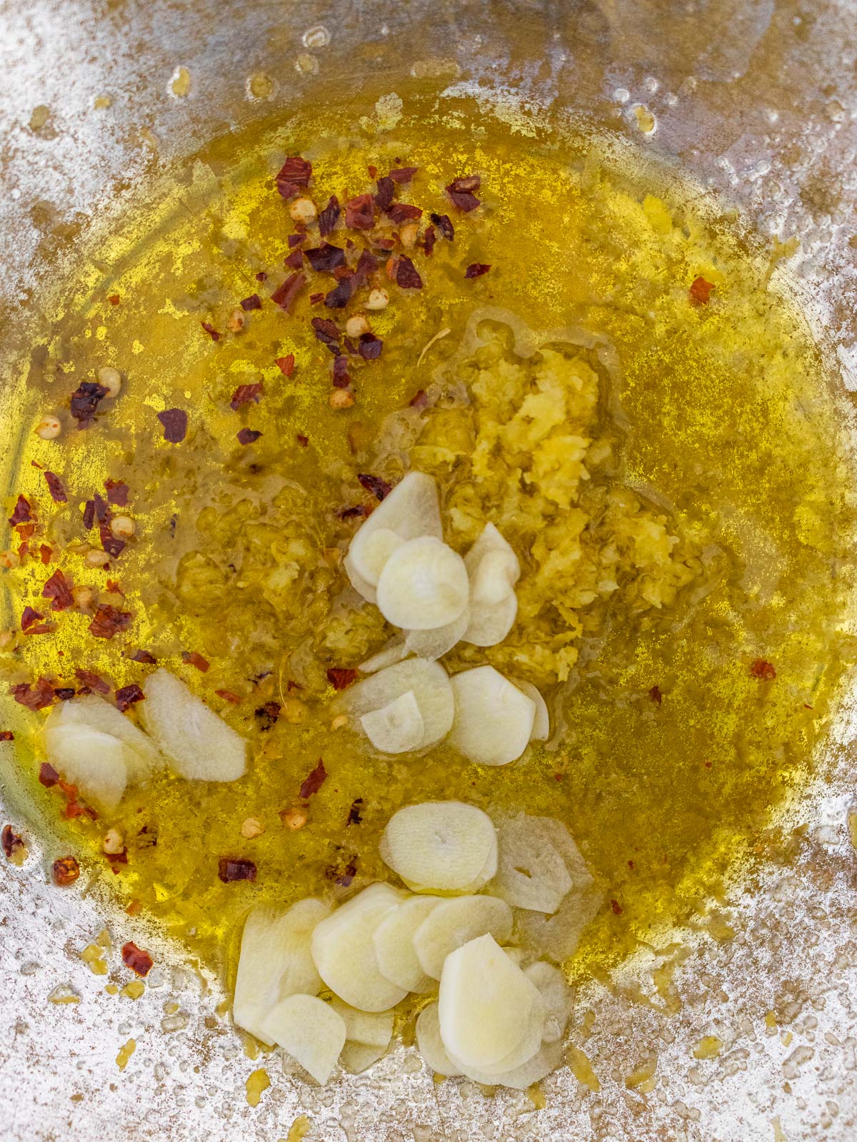 adding all ingredients in a bowl to prep the marinade