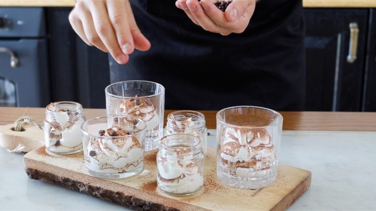 portioning the coffee mousse into small glasses
