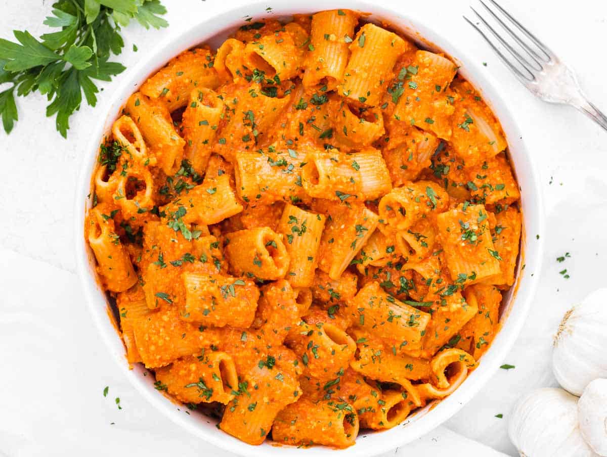 red pepper pasta in a serving bowl