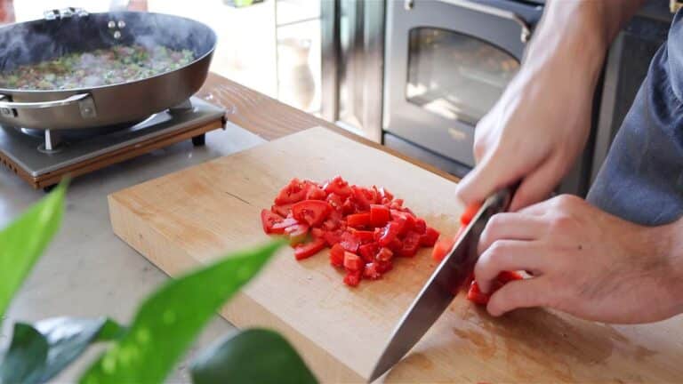 chopping the tomatoes
