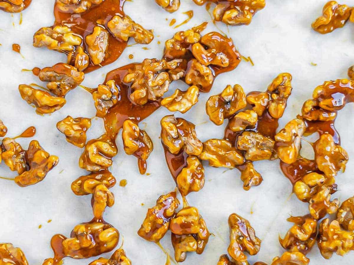 Candied walnuts on baking sheet