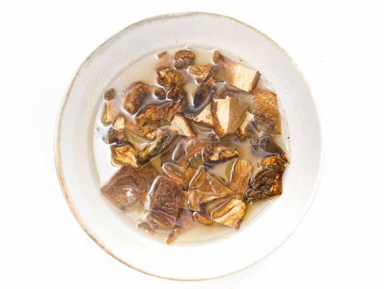 soaking dried mushrooms in a bowl