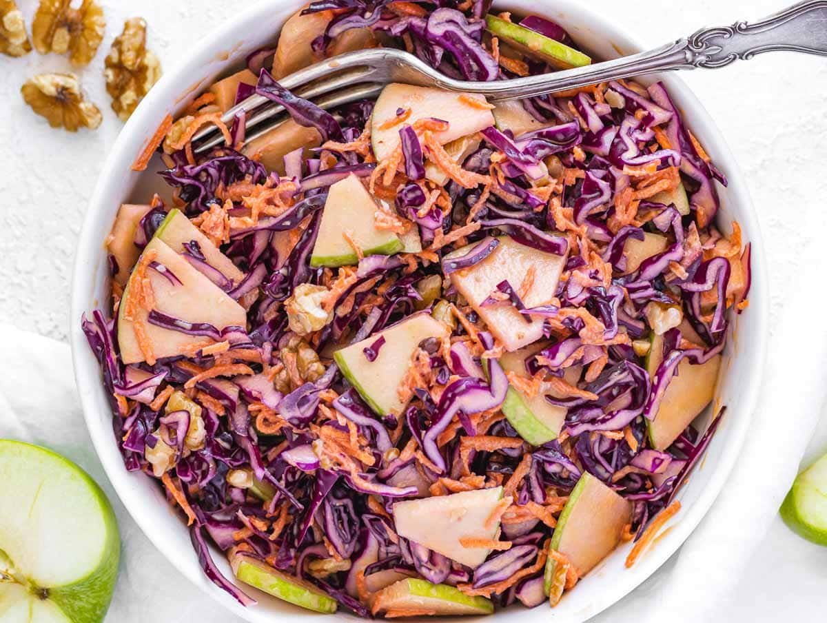 red cabbage slaw with mayonnaise and fork