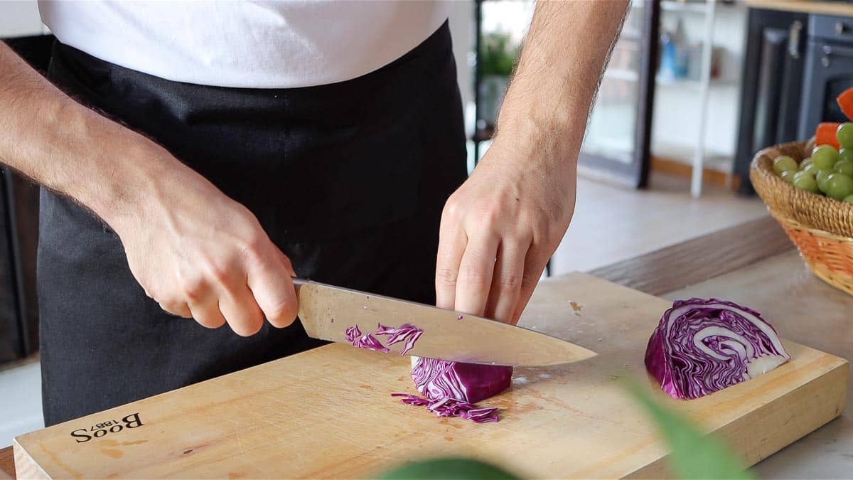 cutting the red cabbage with a knife