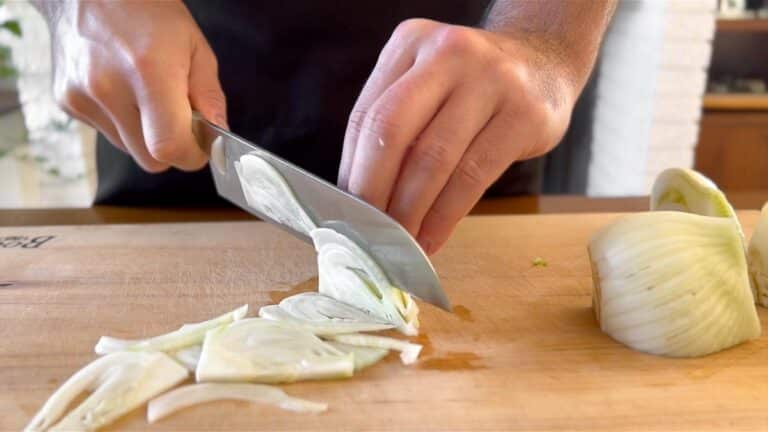 thinly slicing the fennel