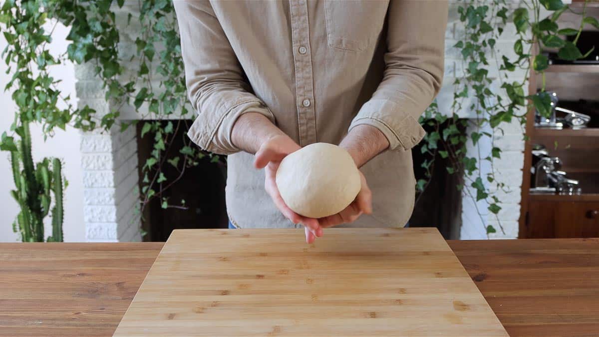 shaping the dough into a ball