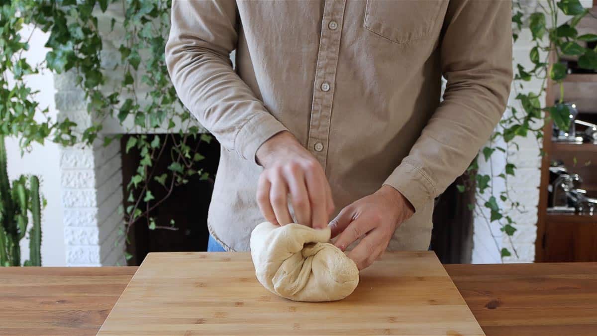 folding the dough on itself to create structure