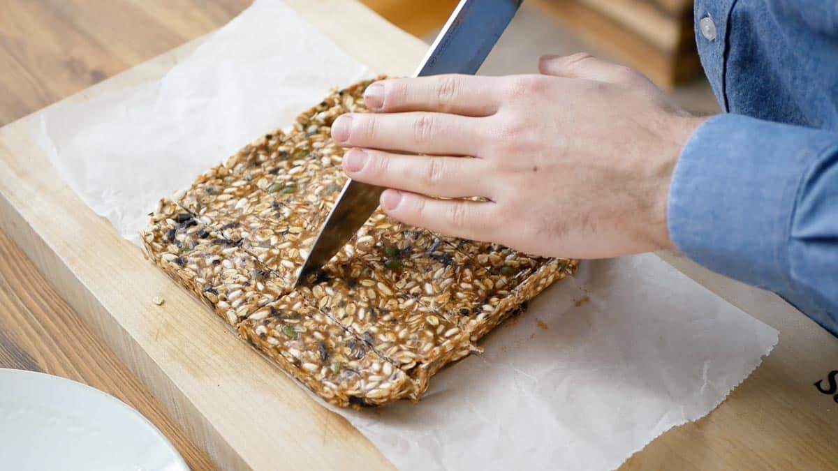cutting the healthy granola bars with peanut butter