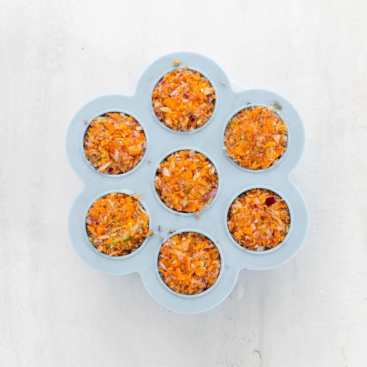 finely chopped celery, carrot and onion in a freezer container