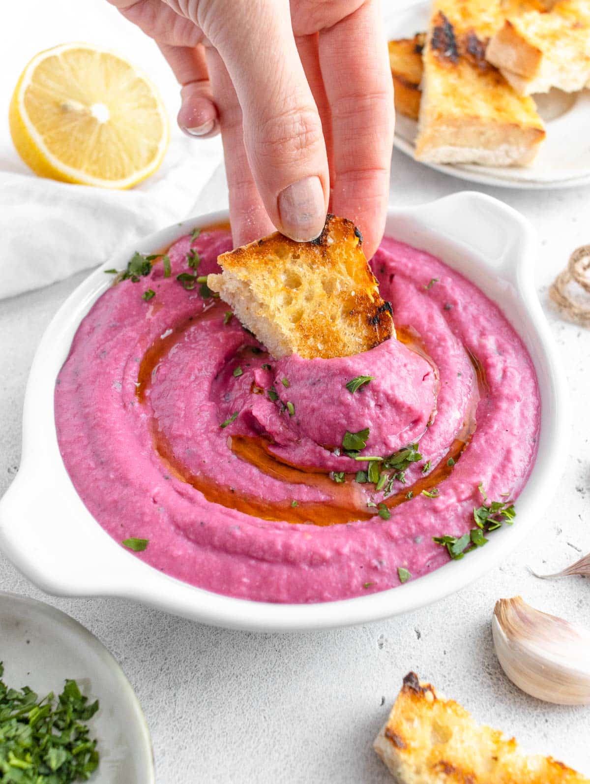 white bean dip with red beet