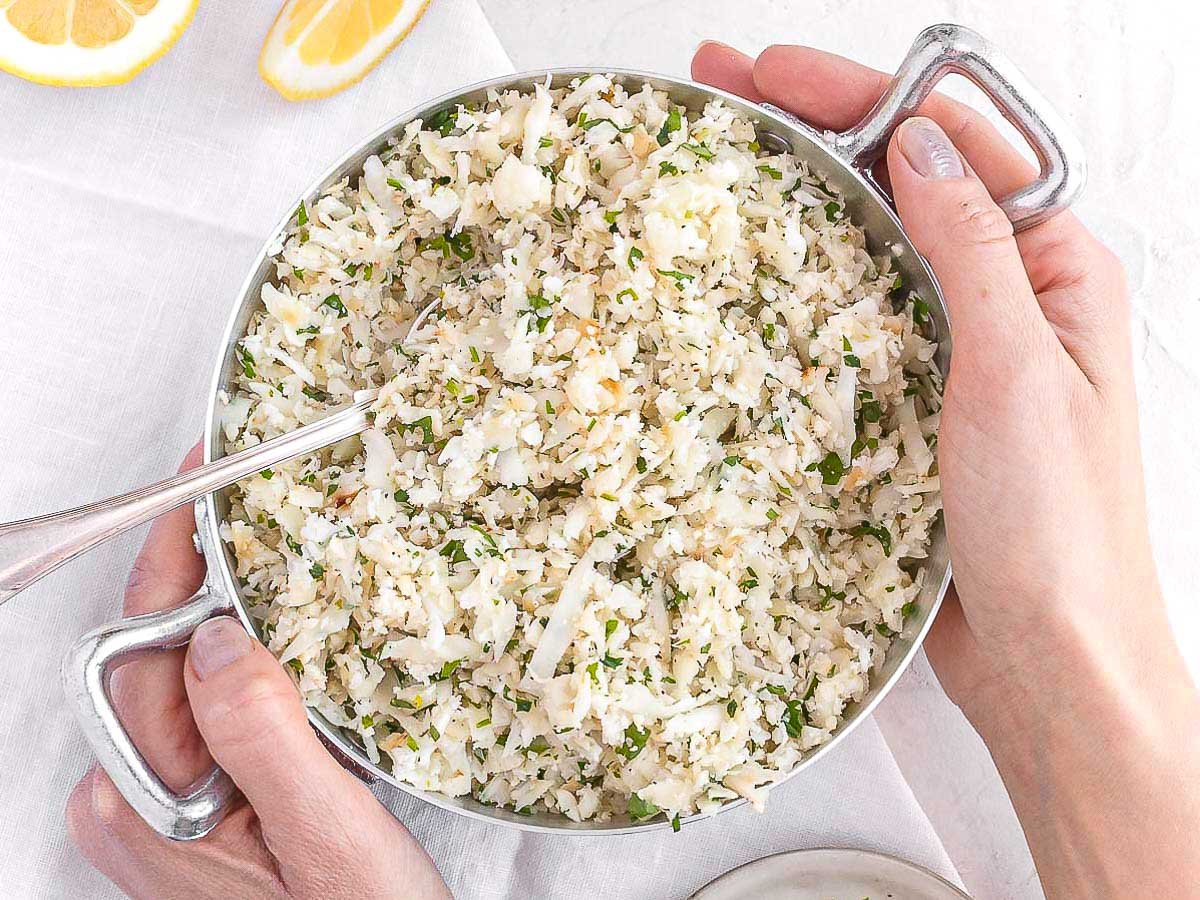cauliflower rice with hands