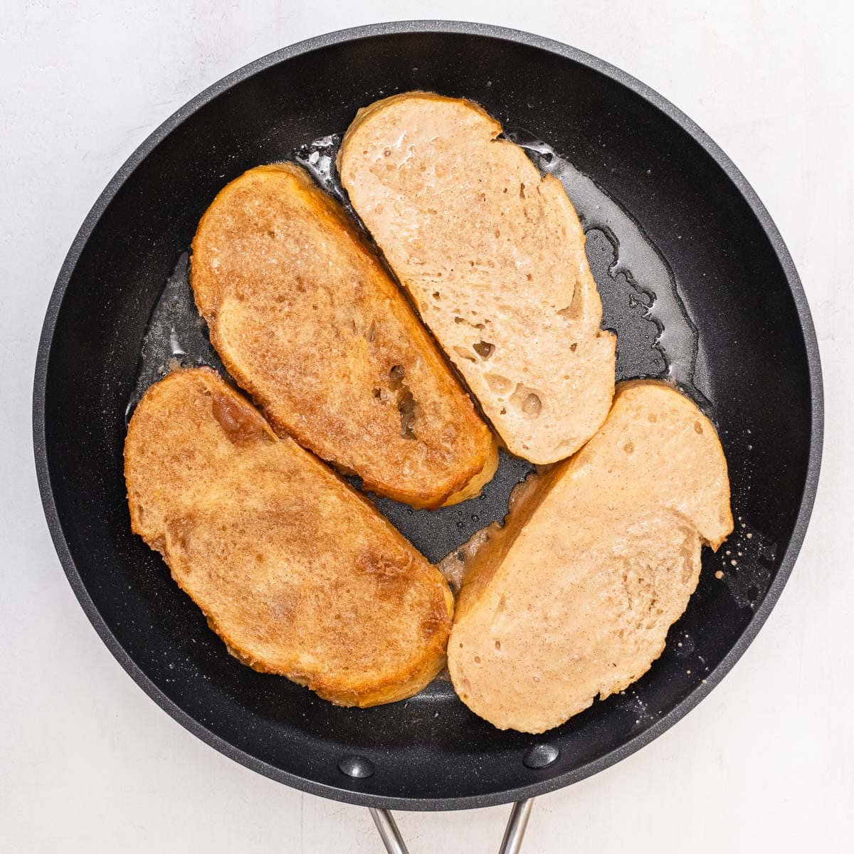 frying 4 slices of vegan french toast
