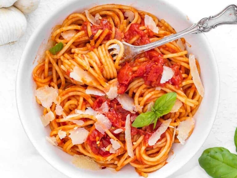 tomato basil pasta or spaghetti al pomodoro with shaved parmesan