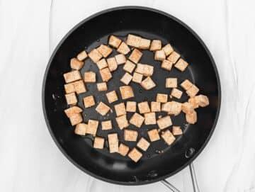 frying the tofu on a pan