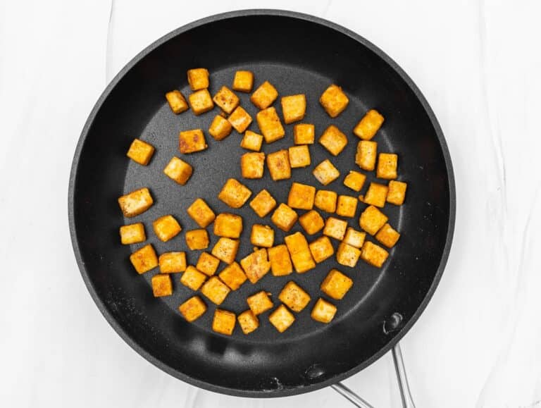 pan fried tofu in a non-stick pan