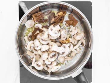 mushrooms and soaked dried mushrooms in the pot
