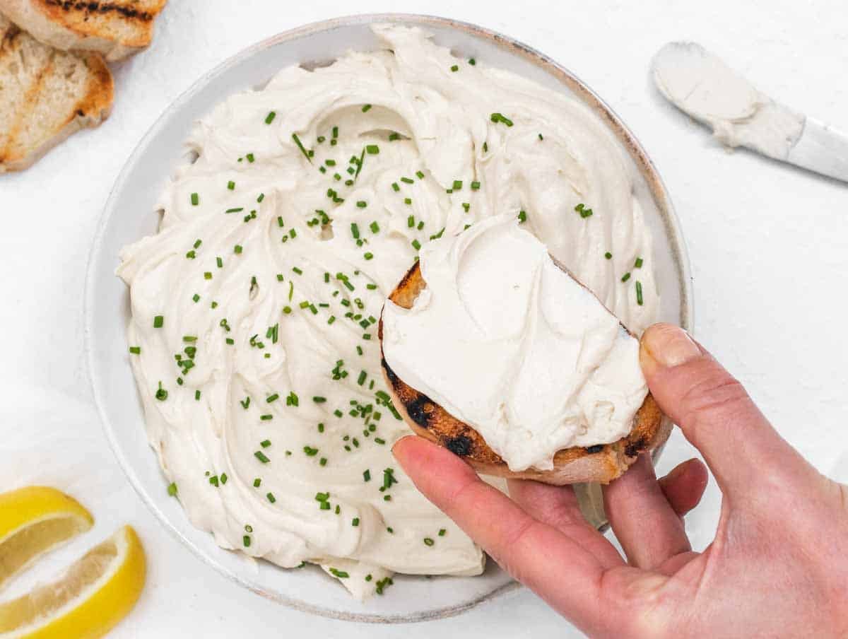 white tofu cream cheese with hand