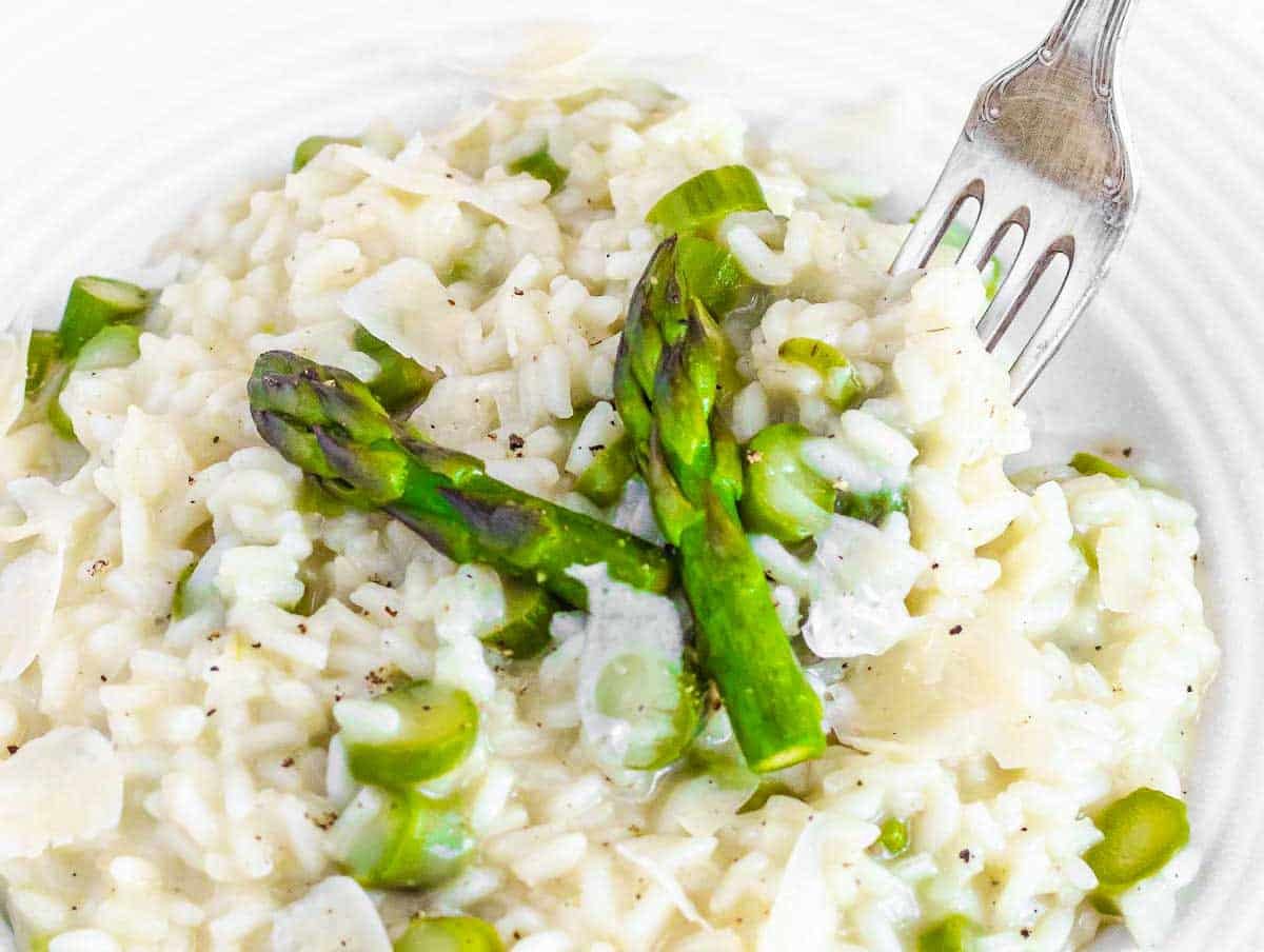 a forkful of asparagus risotto