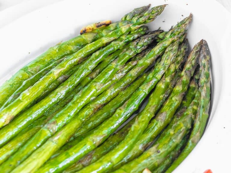 roasted asparagus in a serving platter