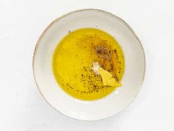 ingredients for lemon vinaigrette in a small bowl