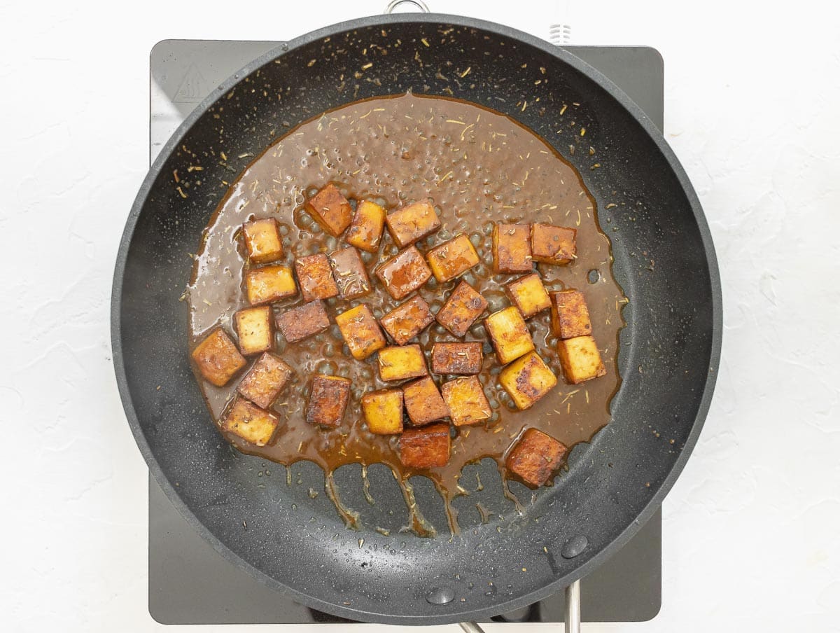 reserved marinade added to pan with tofu