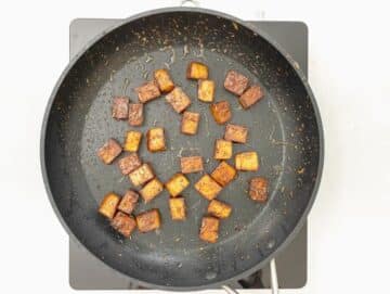 marinated tofu just cooked still in a pan