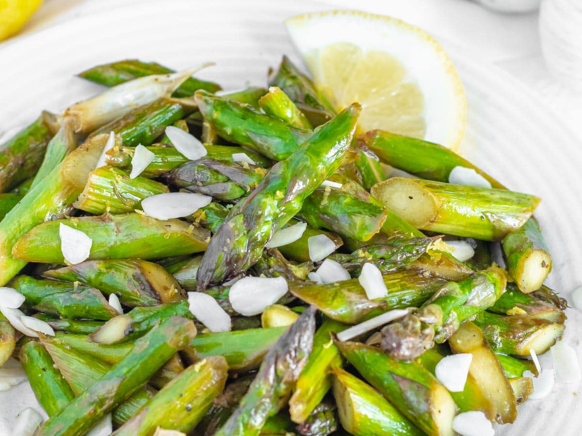 sauteed asparagus serve with lemon and almonds