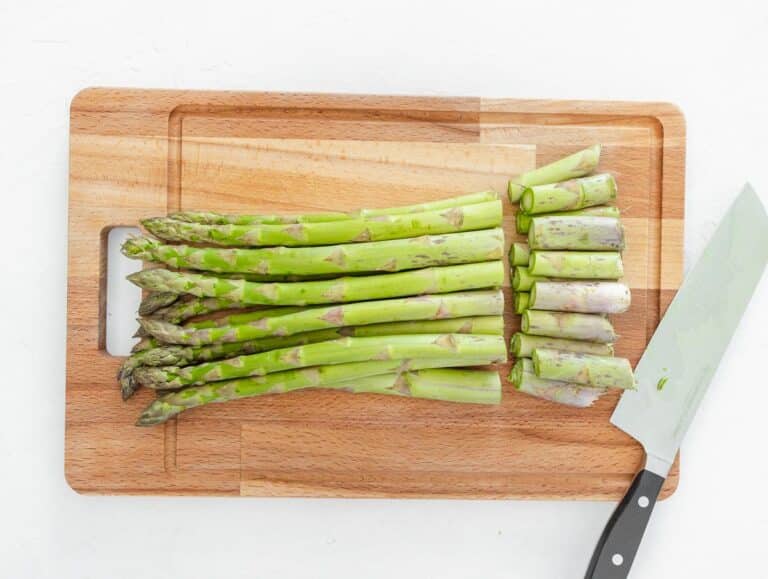 cutting off the woody end of asparagus