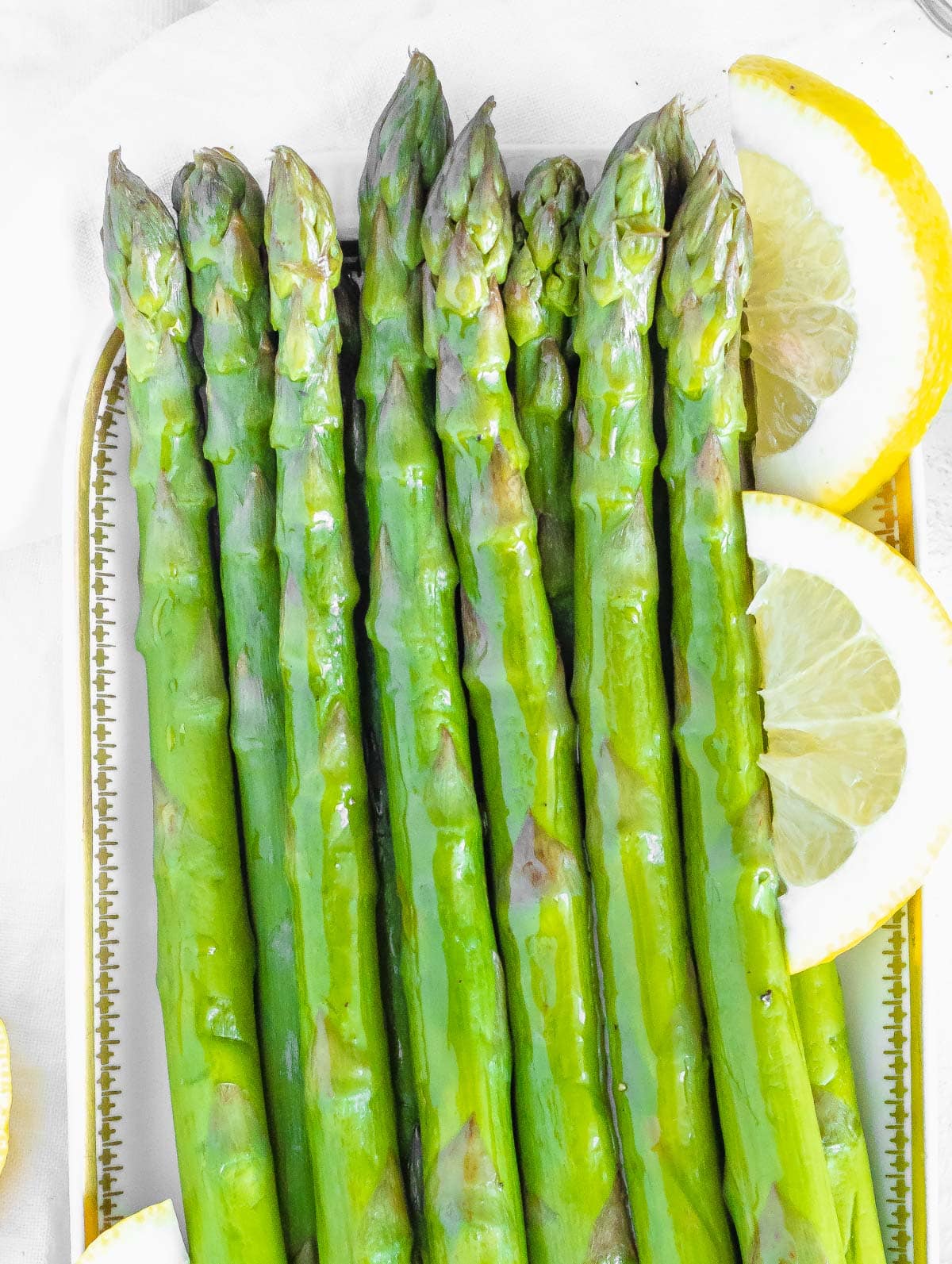steamed asparagus on a serving plate