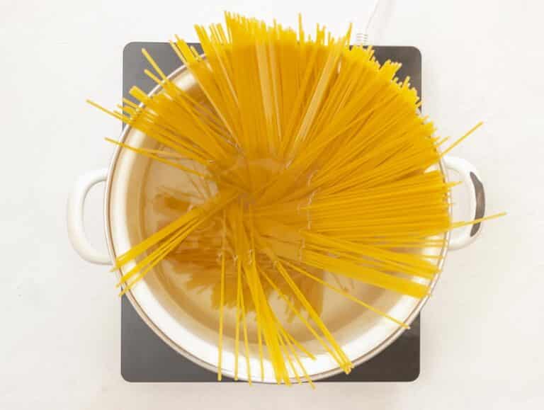 spaghetti pasta boiling in a large pot