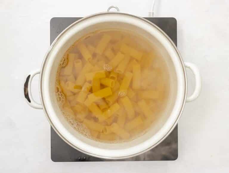 cooking the pasta in boiling water